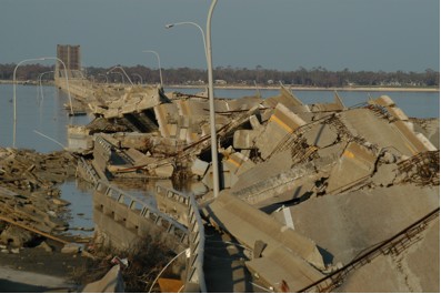 Fig 6. The Hwy 90 bridge from Biloxi, MS to Ocean Springs, MS, lay in a twisted mass as result of catastrophic wind and storm surge from Hurricane Katrina (November 2005).