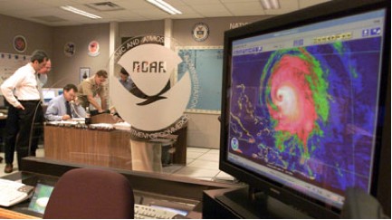 Photograph of forecasters at NOAA’s National Hurricane Center. Image credit: NOAA/NHC.